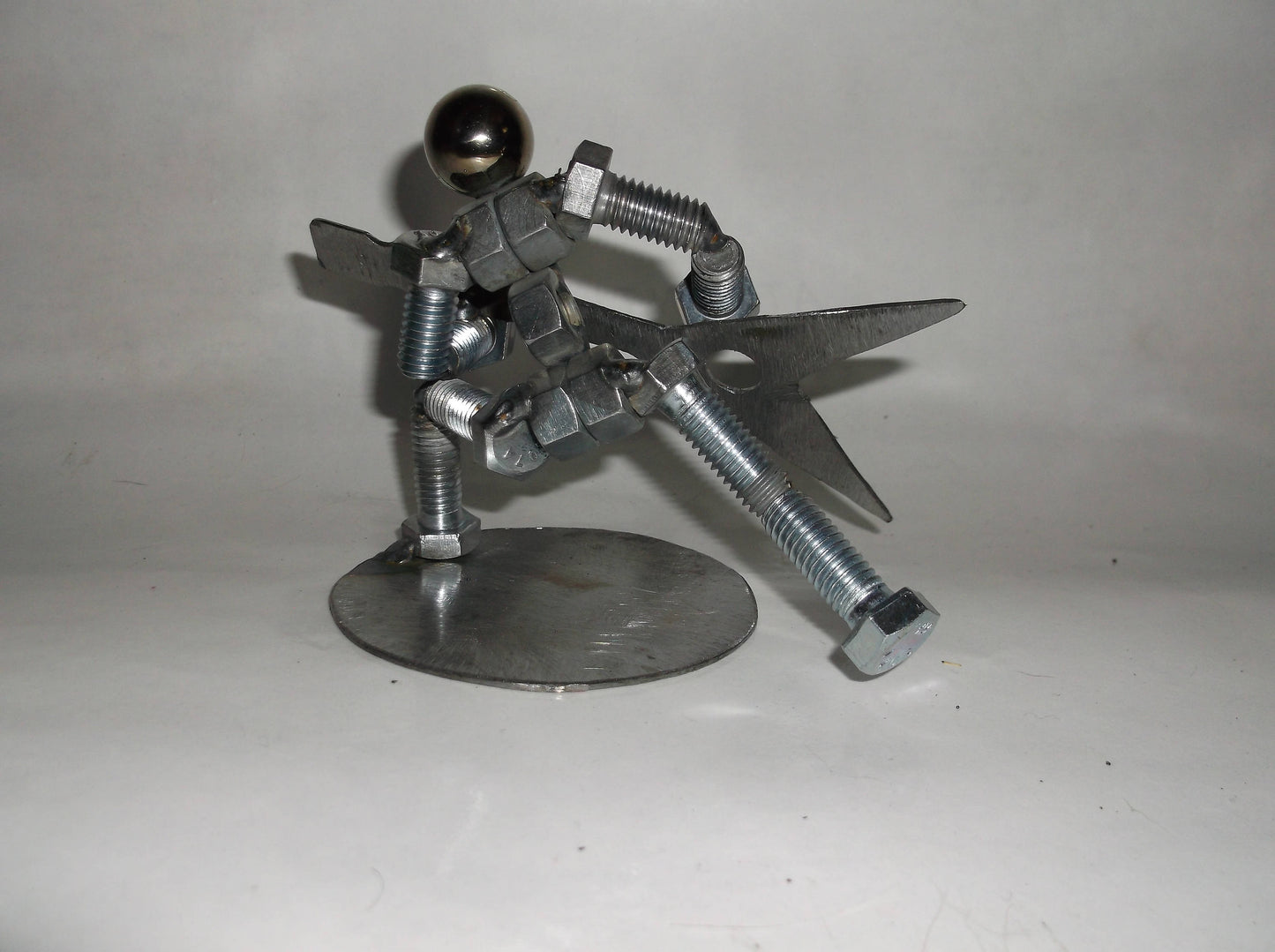 Guitarist Metal Bolt Figurine. Musicians, electric guitar