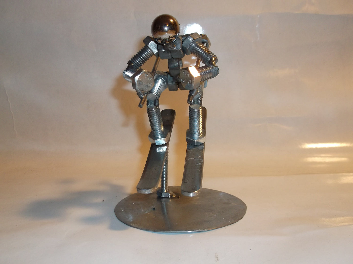 Skier Metal Bolt Figurine