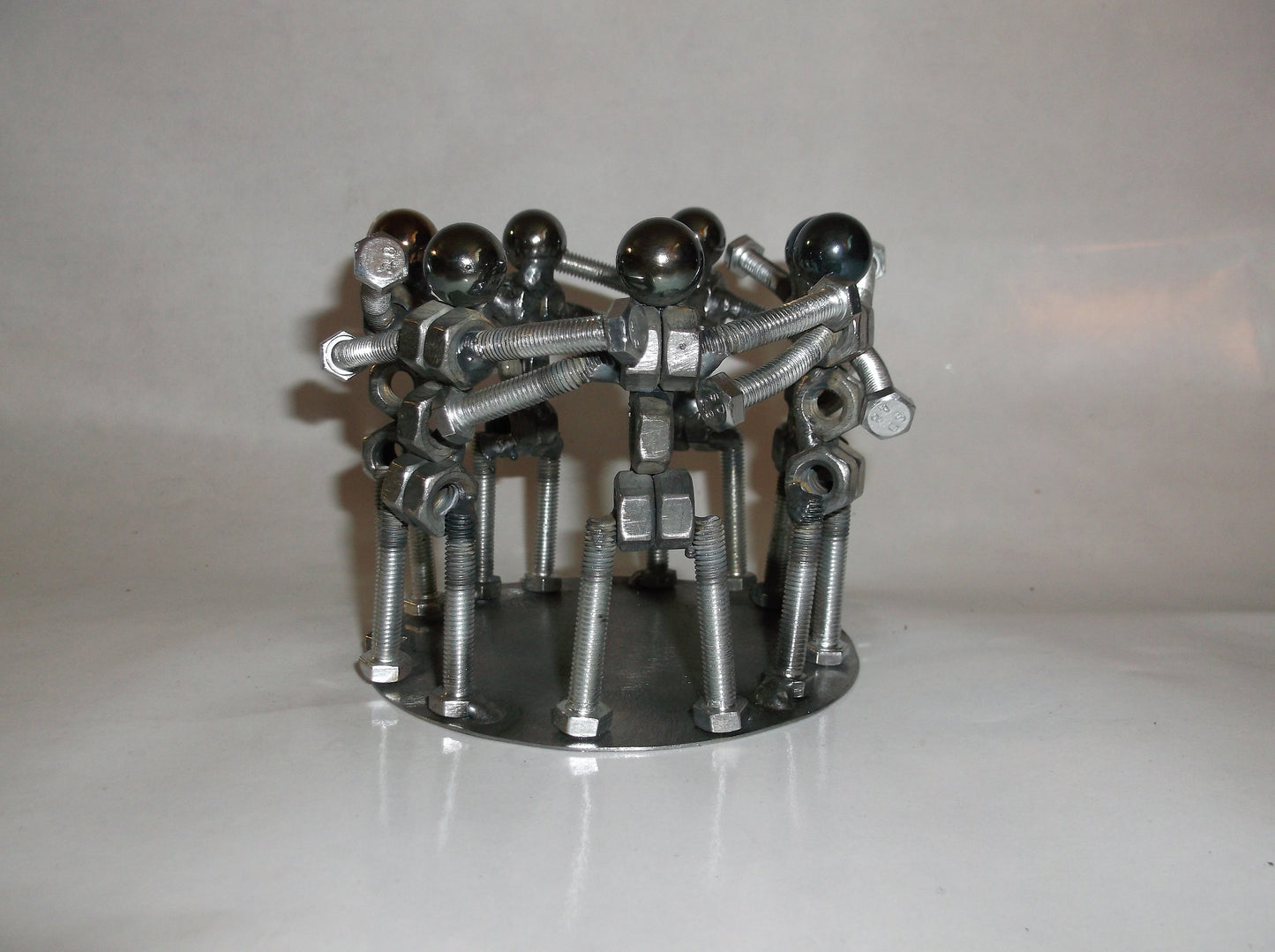 Huddling Metal Bolt People, Group Hug, Team