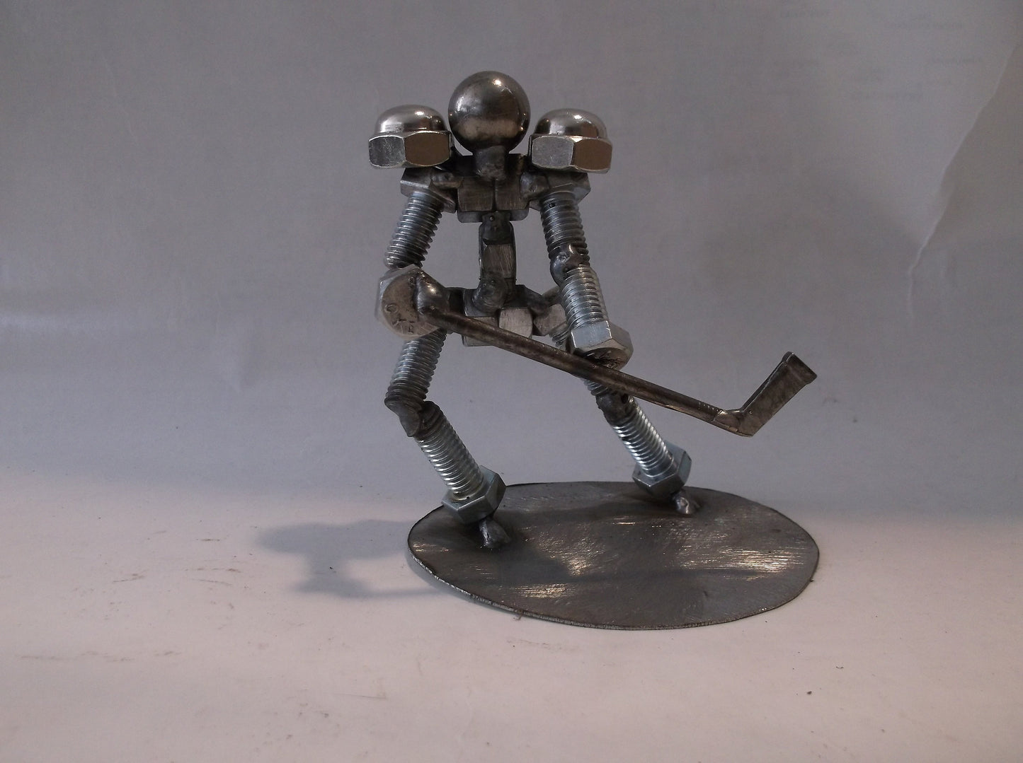 Hockey Player, Metal Bolt Figurine, Athlete, ice skate art sports