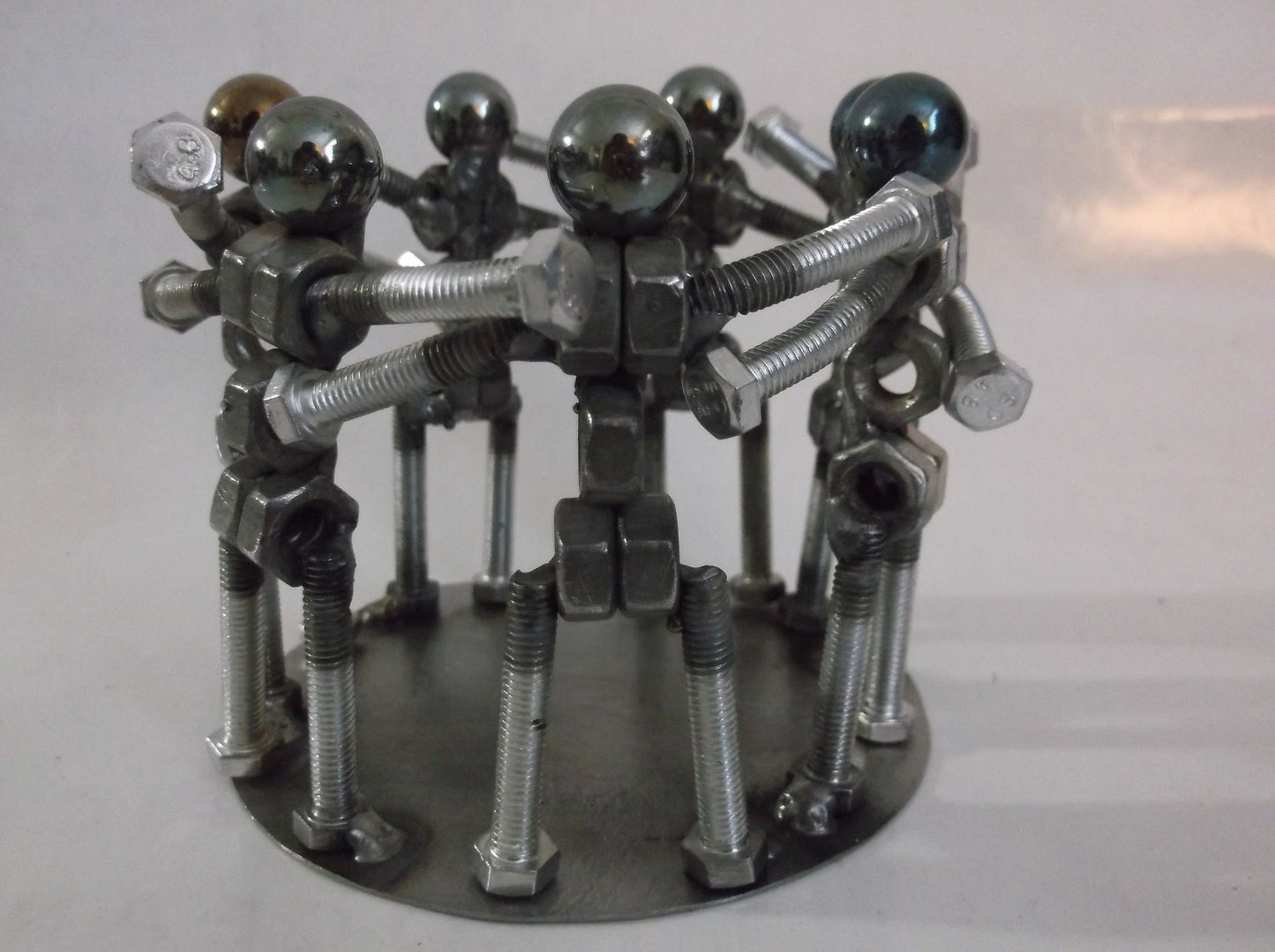 Huddling Metal Bolt People, Group Hug, Team