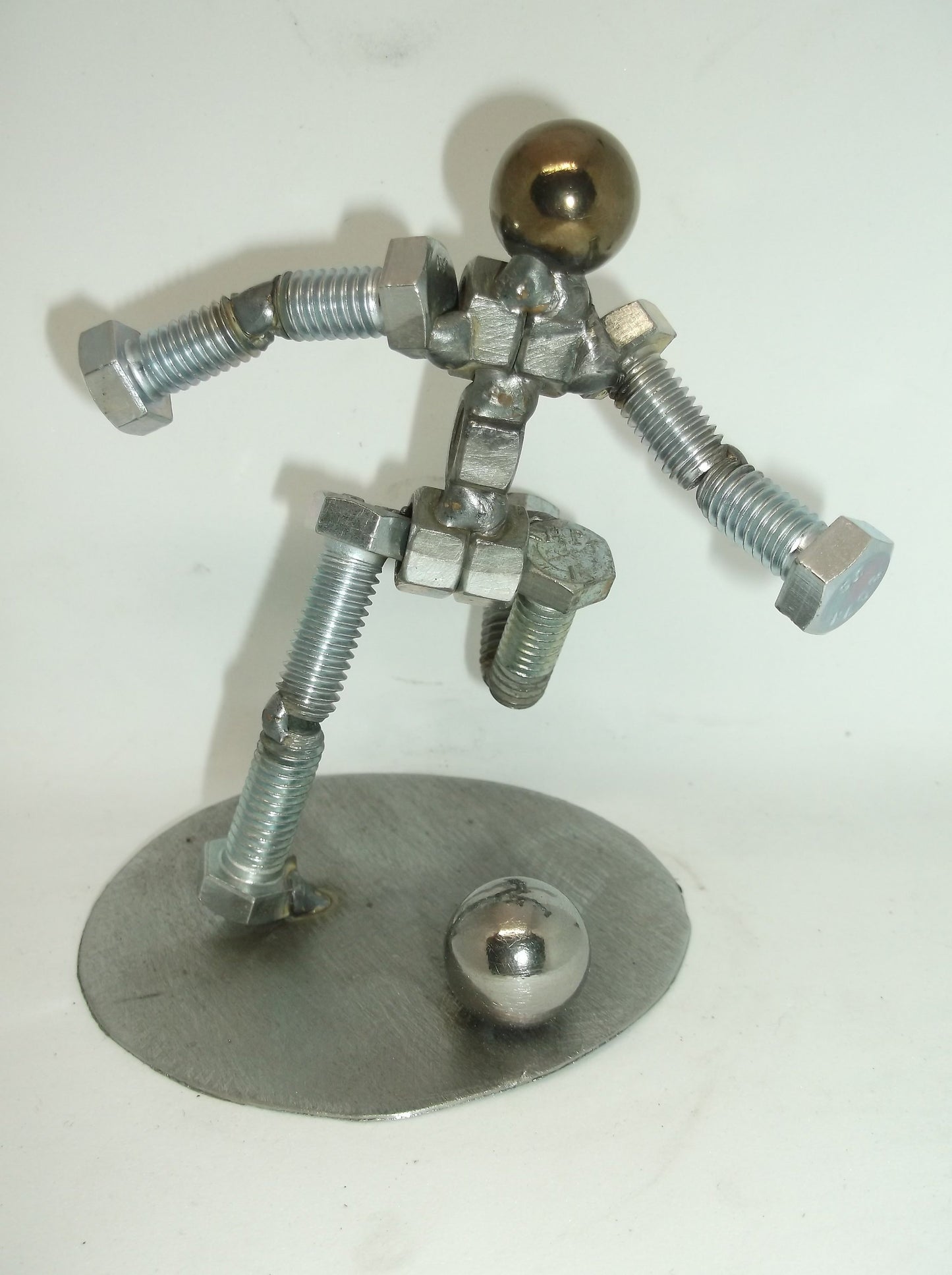 Soccer Player Metal Bolt Figurine, Kick shot athlete, Upcycled Metal Art