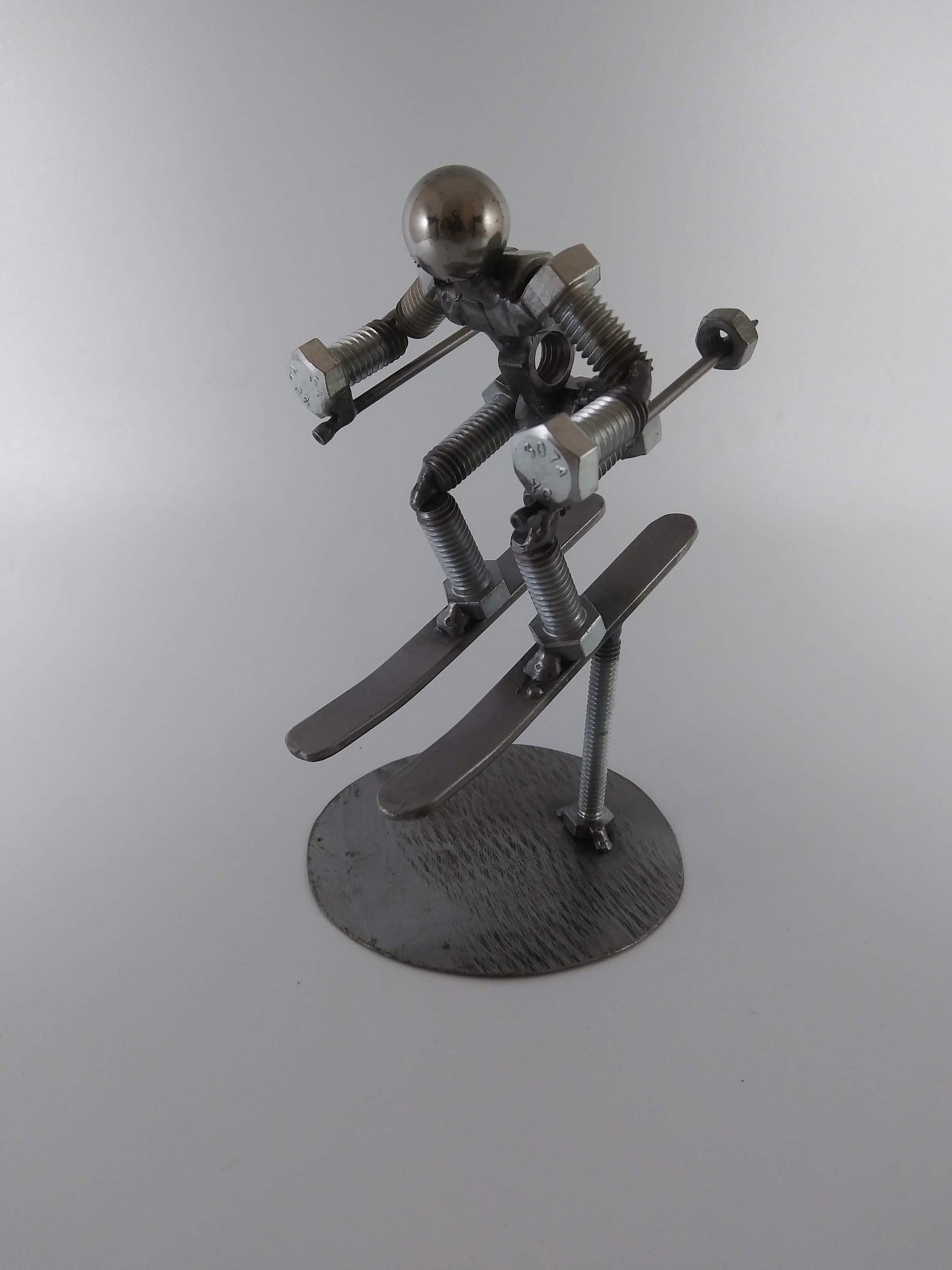 Skier Metal Bolt Figurine