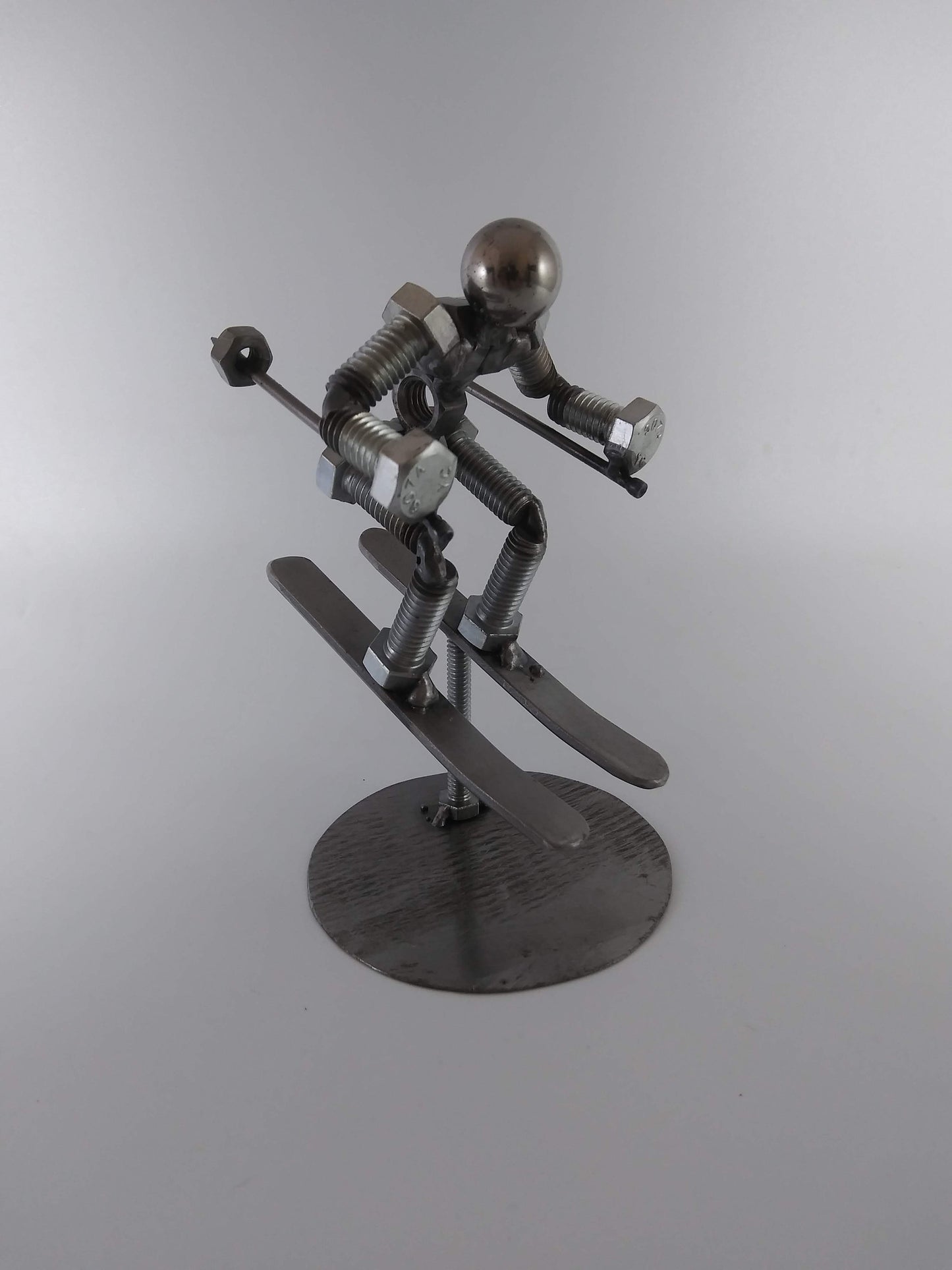 Skier Metal Bolt Figurine